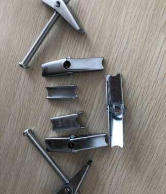 Toggle bolts components made by progressive stamping machine