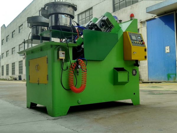 Double station drop in anchor bush automatic thread tapping machine