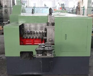 Round coupling nuts forming machine