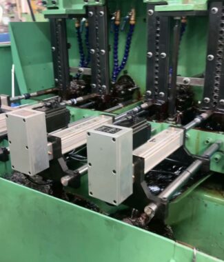 Four stations all servo motors and pushing cylinders nuts thread tapping machine
